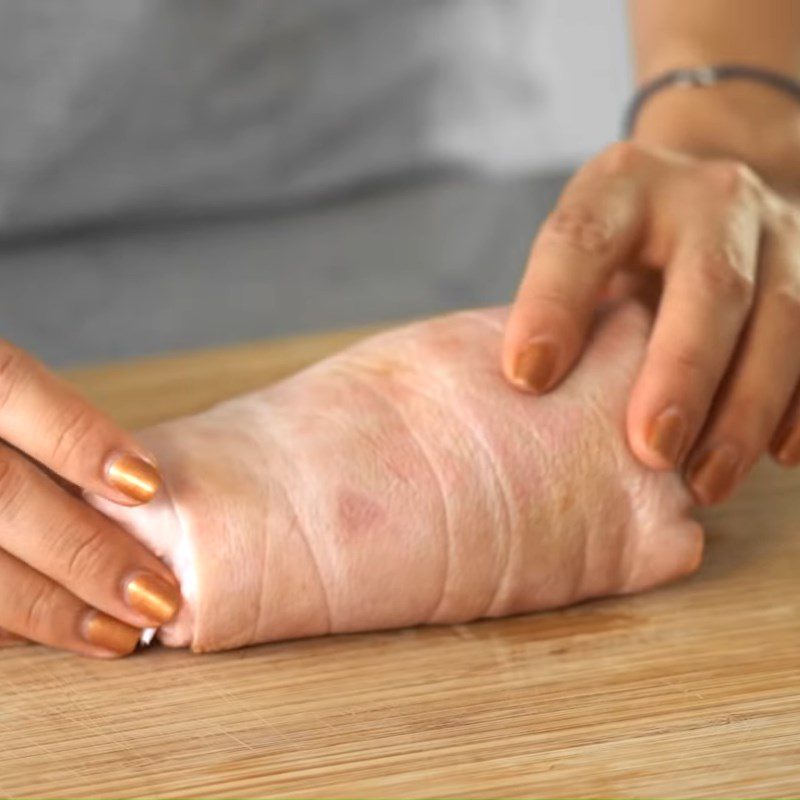 Step 1 Preprocessing and wrapping pork leg Soy Sauce Braised Pork Leg