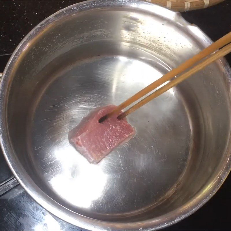 Step 1 Prepare and boil the pork for Pork and Pennywort Porridge