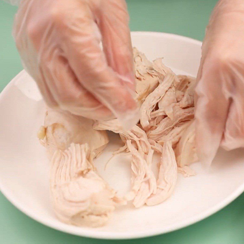 Step 1 Prepare and boil the chicken for Land Squash Salad