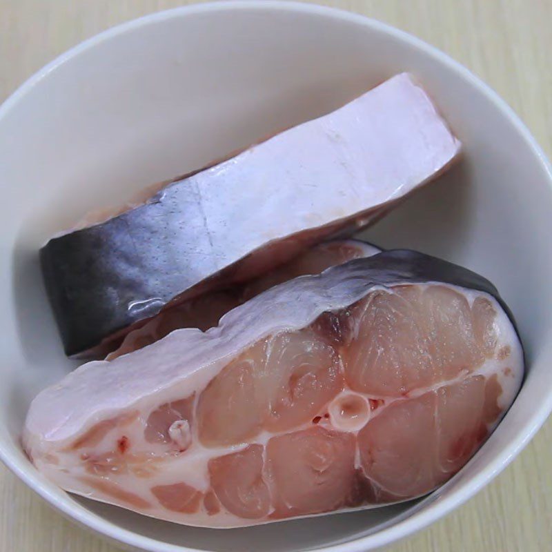 Step 1 Prepare and marinate basa fish with pork belly