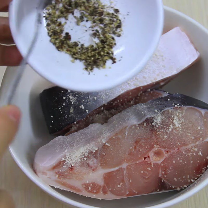 Step 1 Prepare and marinate basa fish with pork belly