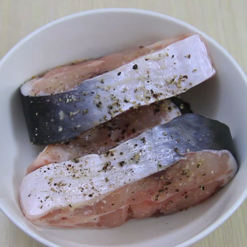 Step 1 Prepare and marinate basa fish with pork belly