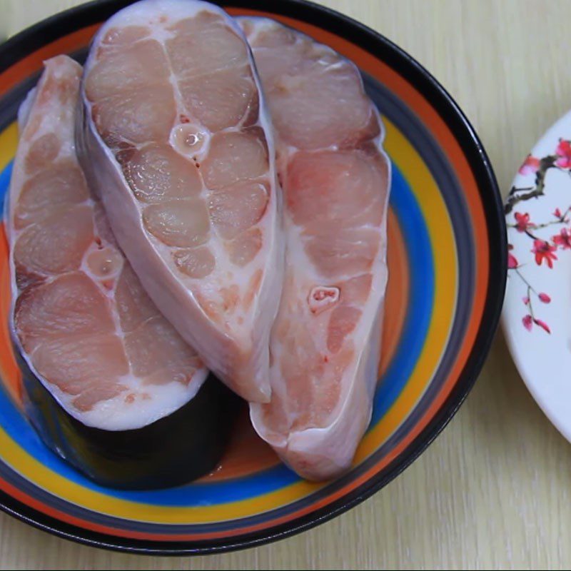 Step 1 Prepare and marinate basa fish with pork belly