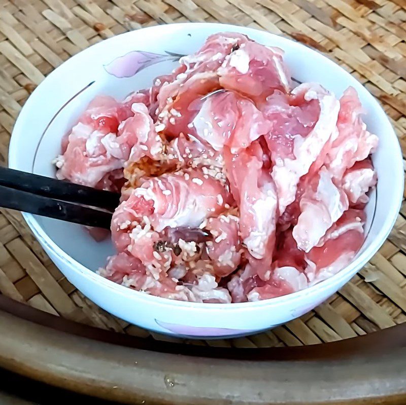 Step 1 Prepare and marinate the beef for Lotus Stem Salad with Shrimp and Beef