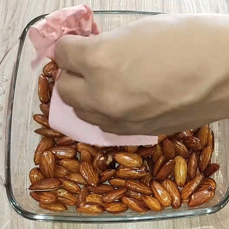 Step 2 Soak oil and toss with salted almonds Roasted salted almonds