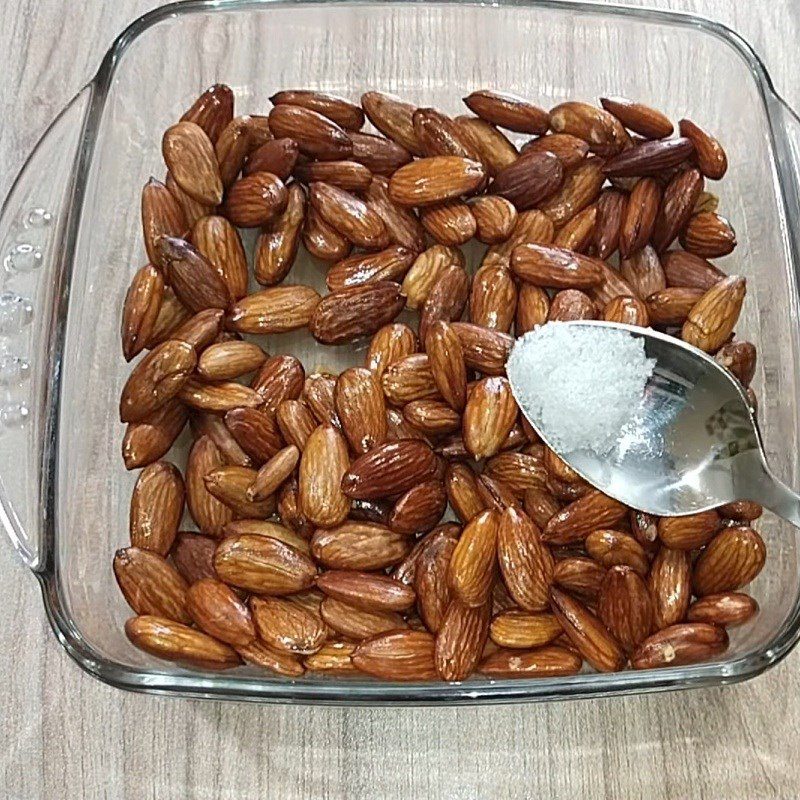 Step 2 Soak oil and toss with salted almonds Roasted salted almonds