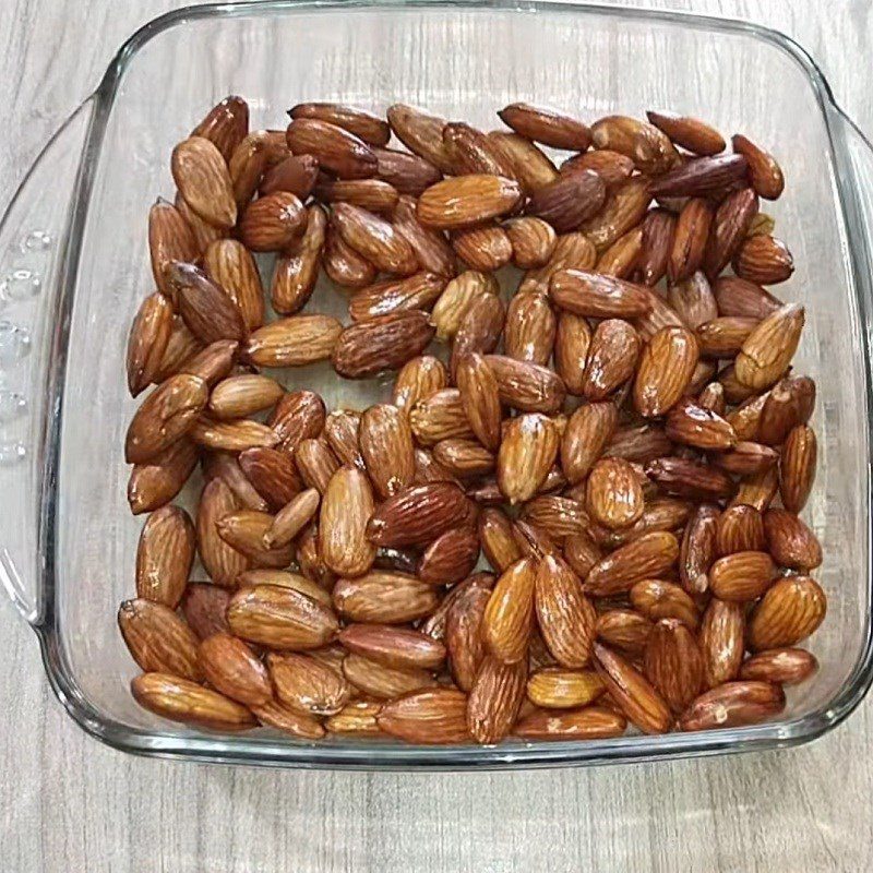 Step 2 Soak oil and toss with salted almonds Roasted salted almonds