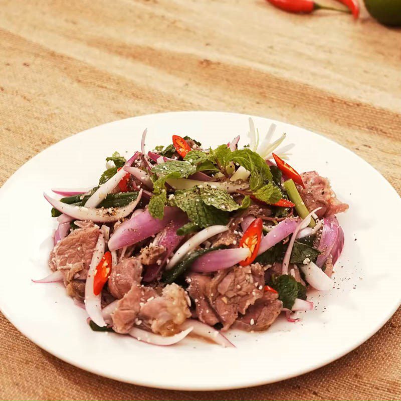 Step 5 Final product Thai beef salad roasted rice