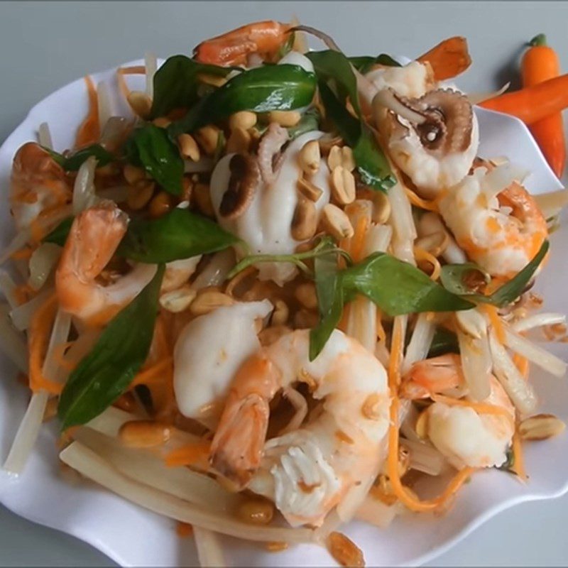 Step 4 Final product Lotus stem salad with shrimp and squid (seafood)