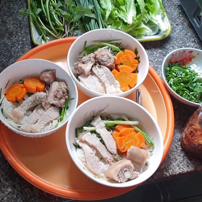 Step 5 Final Product Pork tail noodle soup with meat and pork bones