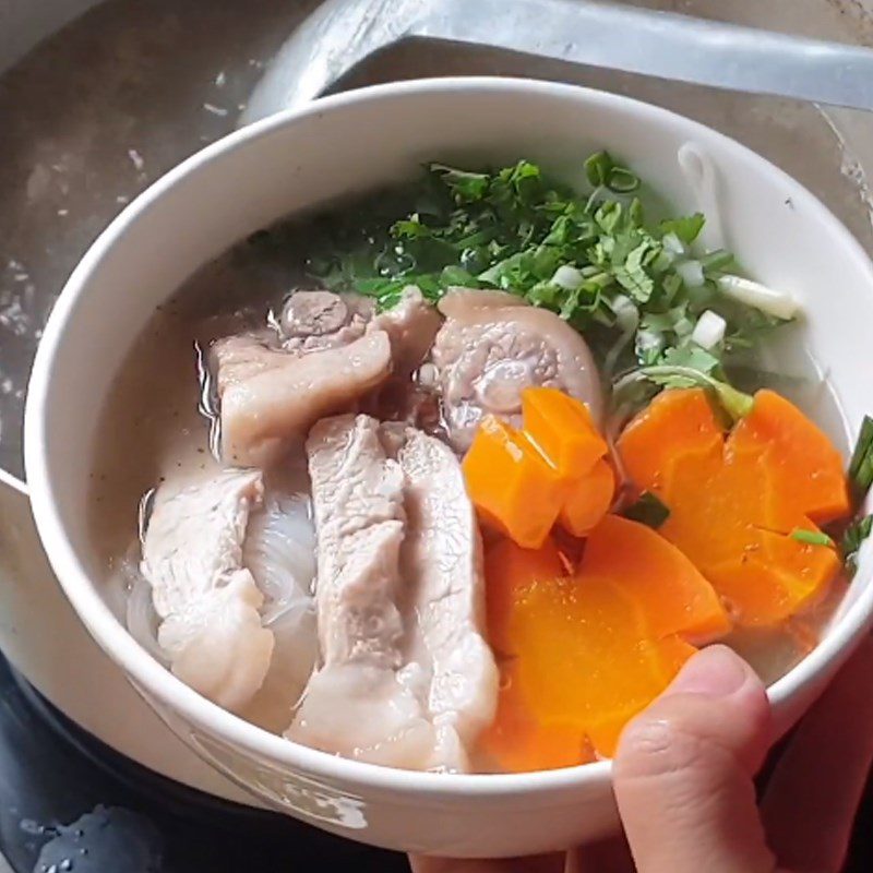 Step 5 Final Product Pork tail noodle soup with meat and pork bones