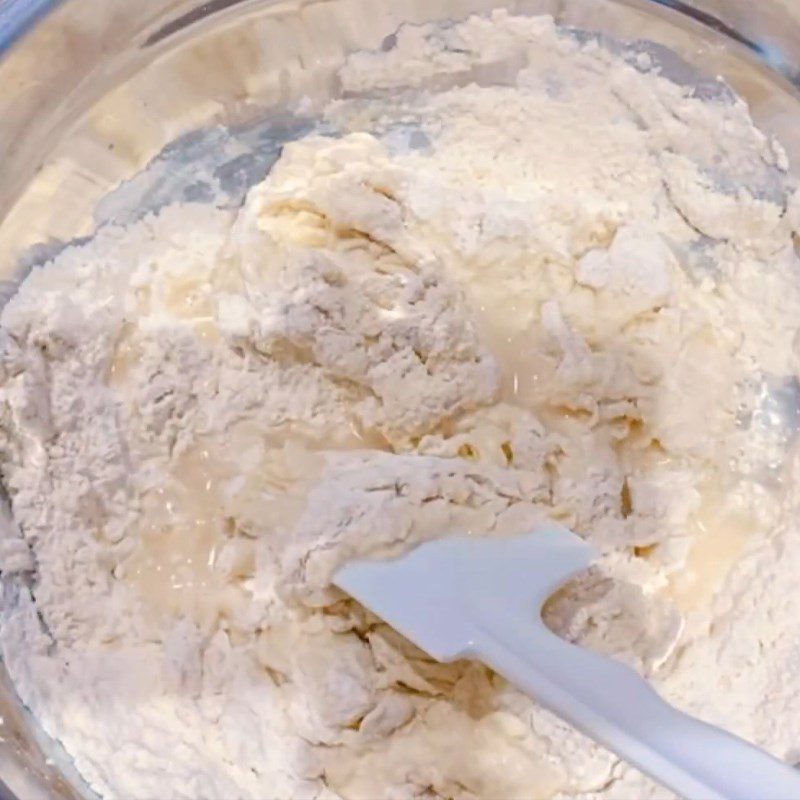 Step 2 Add water and mix the dough for French baguette