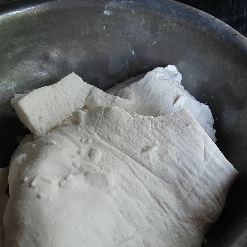 Step 5 Mixing the dough Gac sticky rice dumplings with durian filling