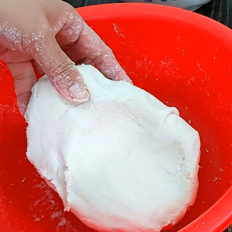 Step 3 Mixing the dough for minced meat cake