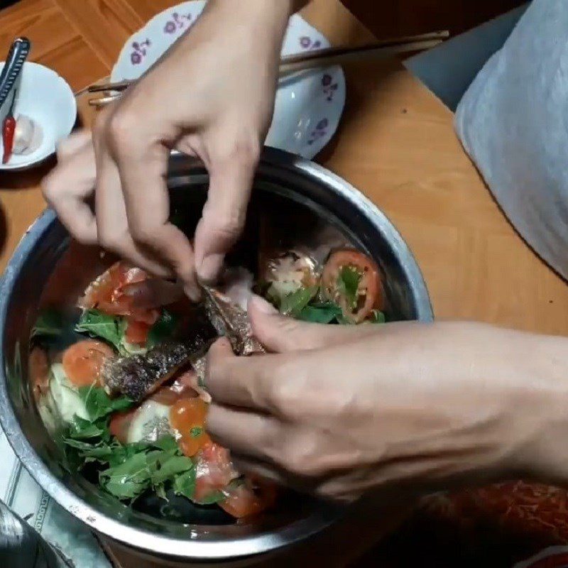 Step 4 Mixing the salad Bitter melon salad with dried snakehead fish