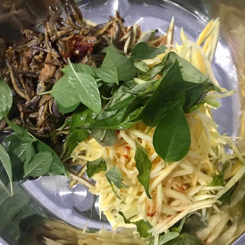 Step 3 Mixing salad Mango salad with dried anchovies