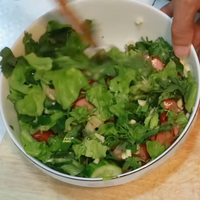 Step 4 Mix the salad for cucumber sausage salad