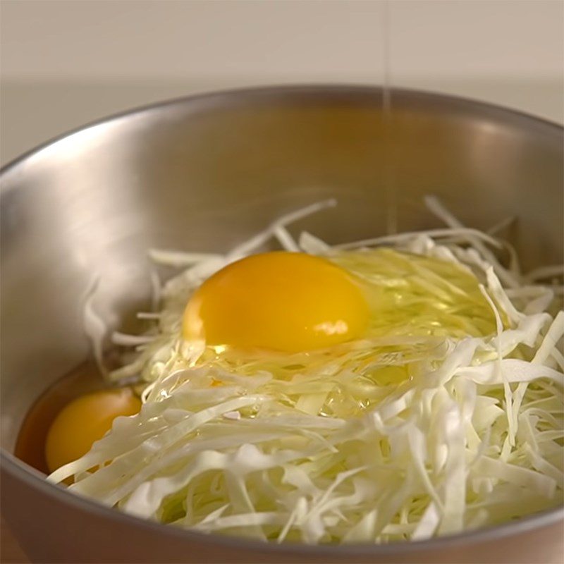 Step 2 Mix the eggs Fried Eggs with Potatoes and Cabbage