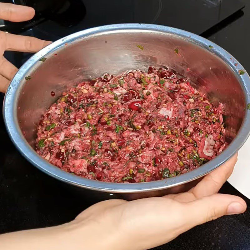 Step 7 Mix and stuff the sausage filling for Cái Tắc porridge