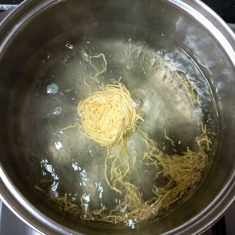 Step 3 Blanching noodles and bok choy Vegetarian noodles with mushrooms