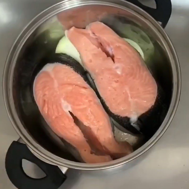 Step 3 Marinate the fish Salmon cooked in coconut water