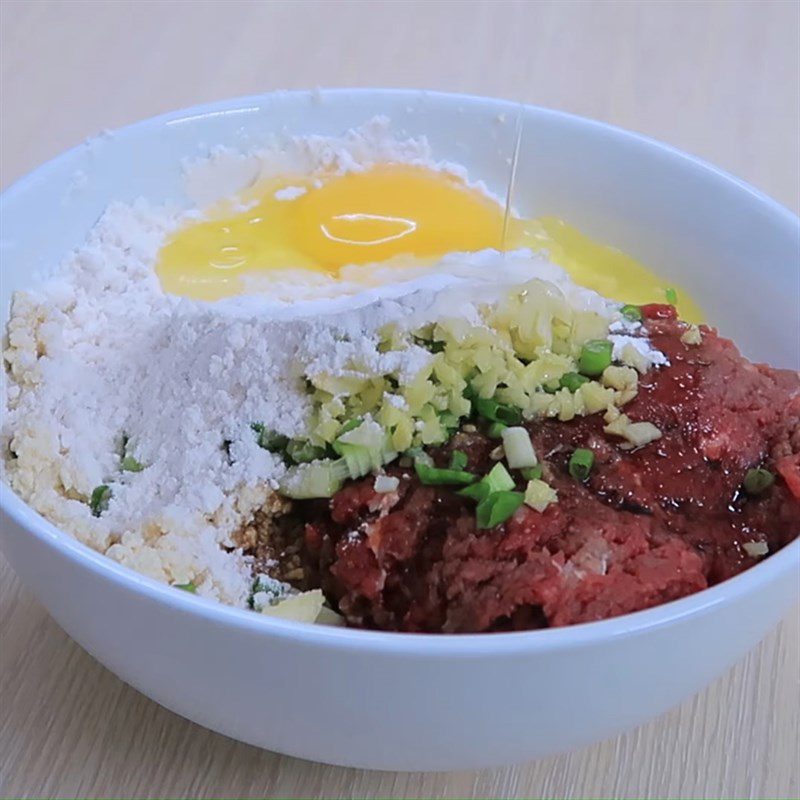 Step 2 Marinate the cake for Fried Beef and Tofu Cake