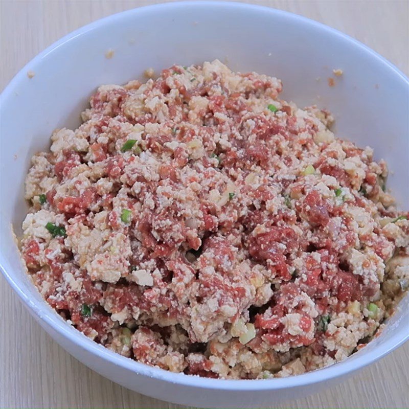 Step 2 Marinate the cake for Fried Beef and Tofu Cake
