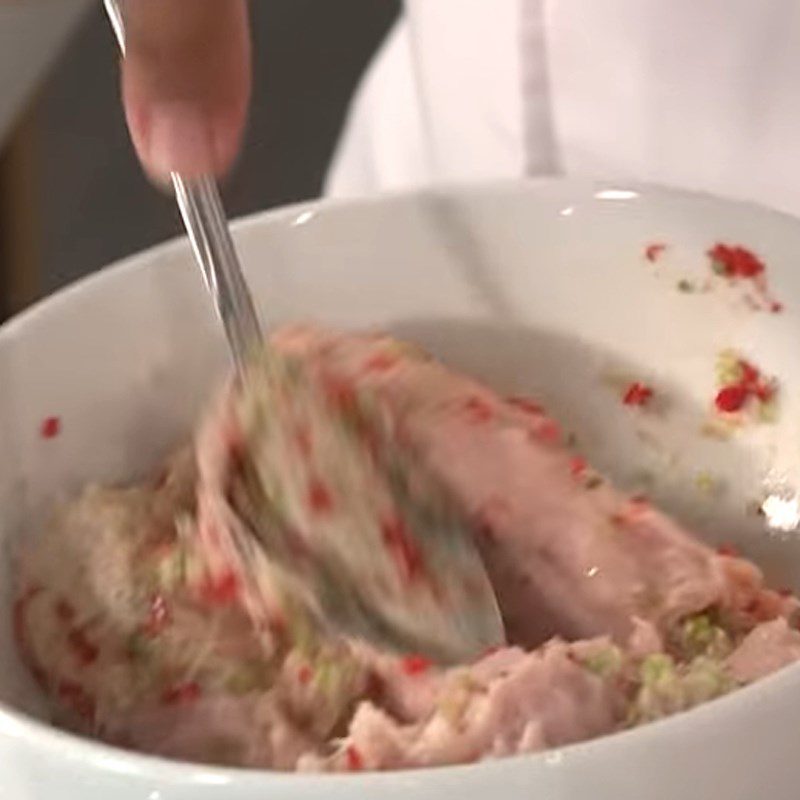 Step 2 Marinate the fish cake for Fried Fish Cake Lotus Root Sandwich