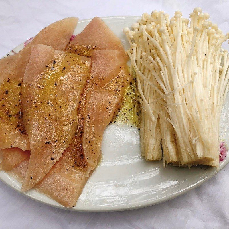 Step 2 Marinate the chicken breast Chicken breast rolled with enoki mushrooms pan-fried