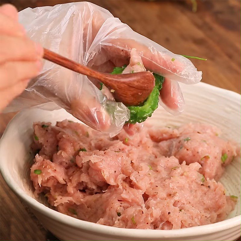 Step 2 Marinate and stuff the fish for stuffed bitter melon soup