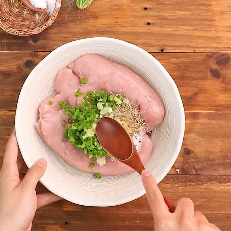 Step 2 Marinate and stuff the fish for stuffed bitter melon soup