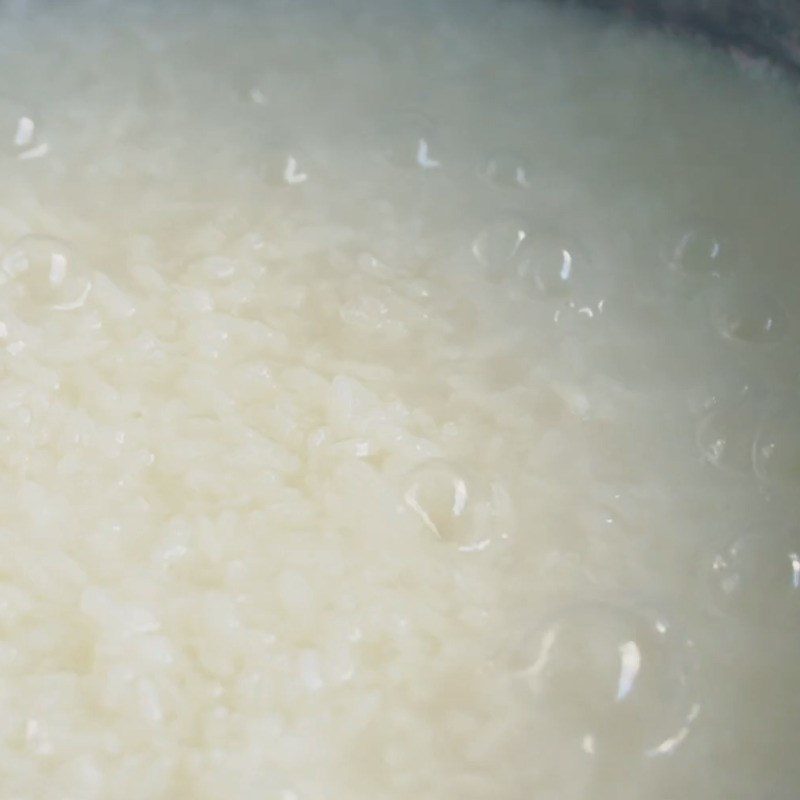 Step 2 Wash and cook sticky rice Red bean dessert with sticky rice