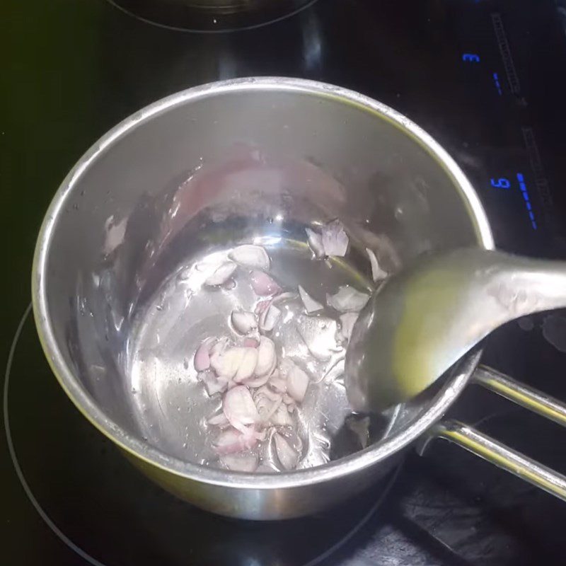 Step 2 Sautéing tomatoes for Sour Mushroom Soup