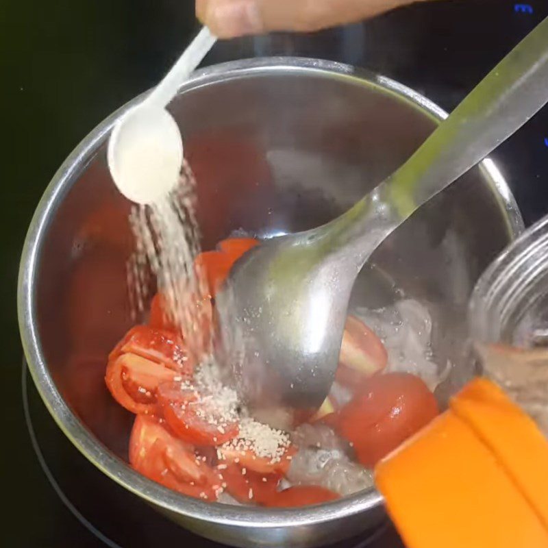 Step 2 Sautéing tomatoes for Sour Mushroom Soup