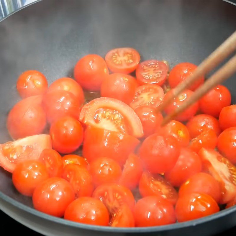 Step 5 Stir-fry tomatoes Bún riêu cua with canned crab