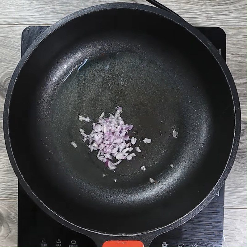 Step 3 Stir-frying ingredients for Taiwanese savory sticky rice