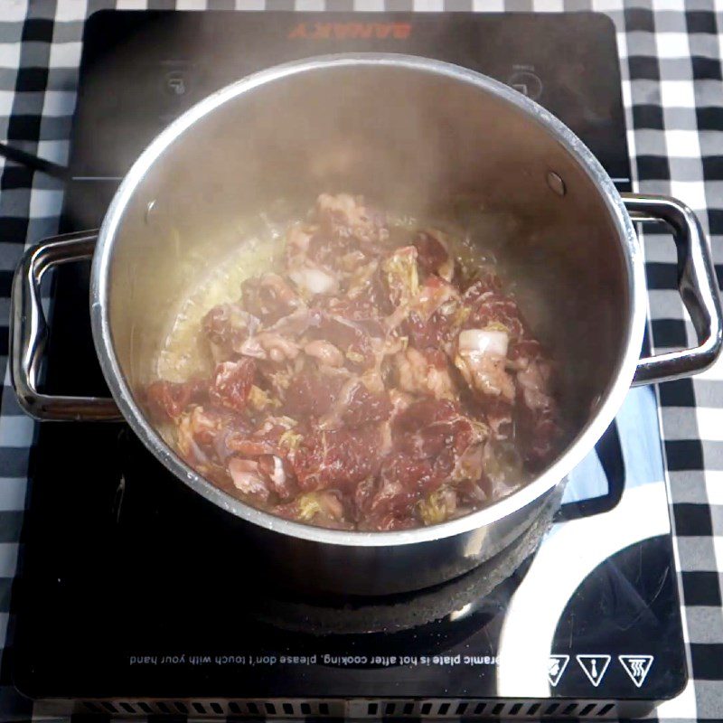 Step 3 Stir-fry ingredients with beef Japanese beef curry