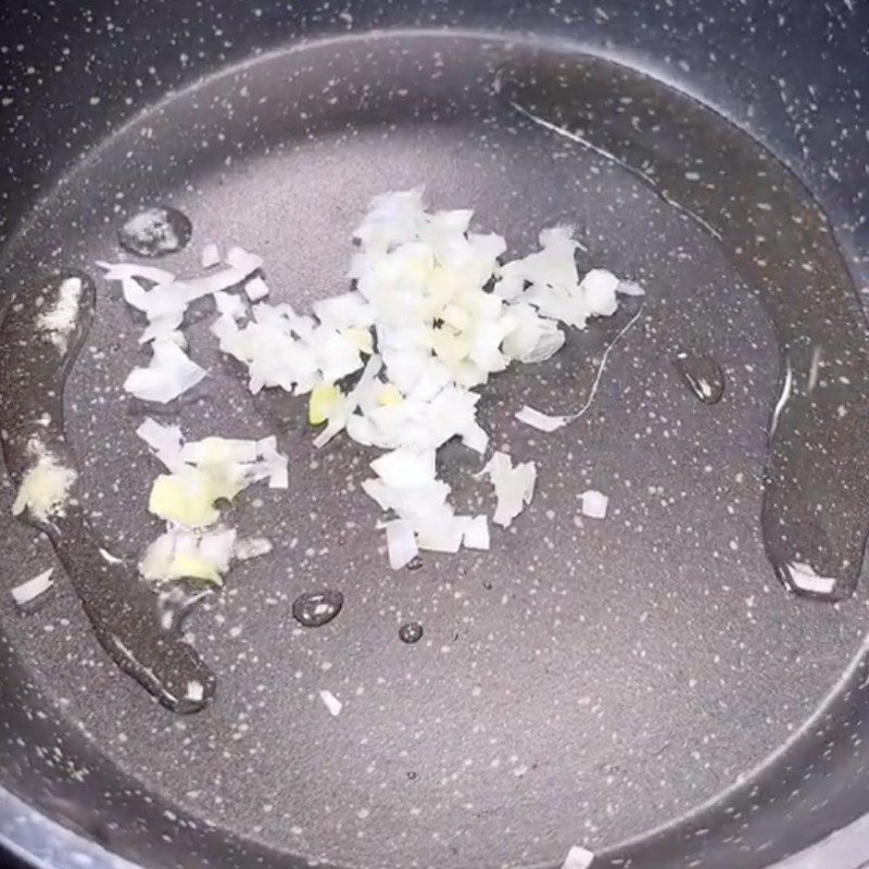 Step 3 Sautéing the filling for vegetarian bánh nậm with chicken thigh mushrooms