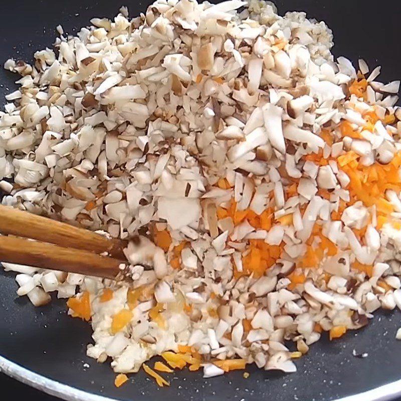 Step 2 Stir-fry filling for vegetarian banh nam with mushroom filling