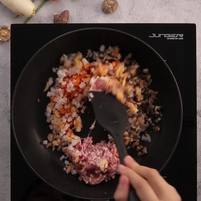 Step 1 Sauté the filling for Savory Meat-Filled Glutinous Rice Balls