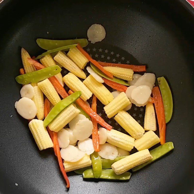 Step 5 Sauté vegetables Baby corn sautéed with beef