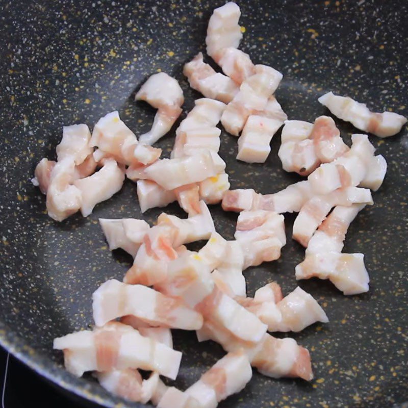 Step 3 Stir-frying meat Basa fish with pork belly