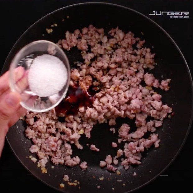 Step 1 Stir-frying minced meat for Mixed Pho