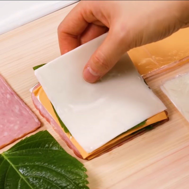 Step 1 Layering the filling for Fried Pork Rolls with Cheese and Ham