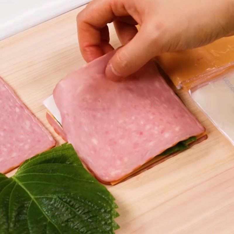 Step 1 Layering the filling for Fried Pork Rolls with Cheese and Ham