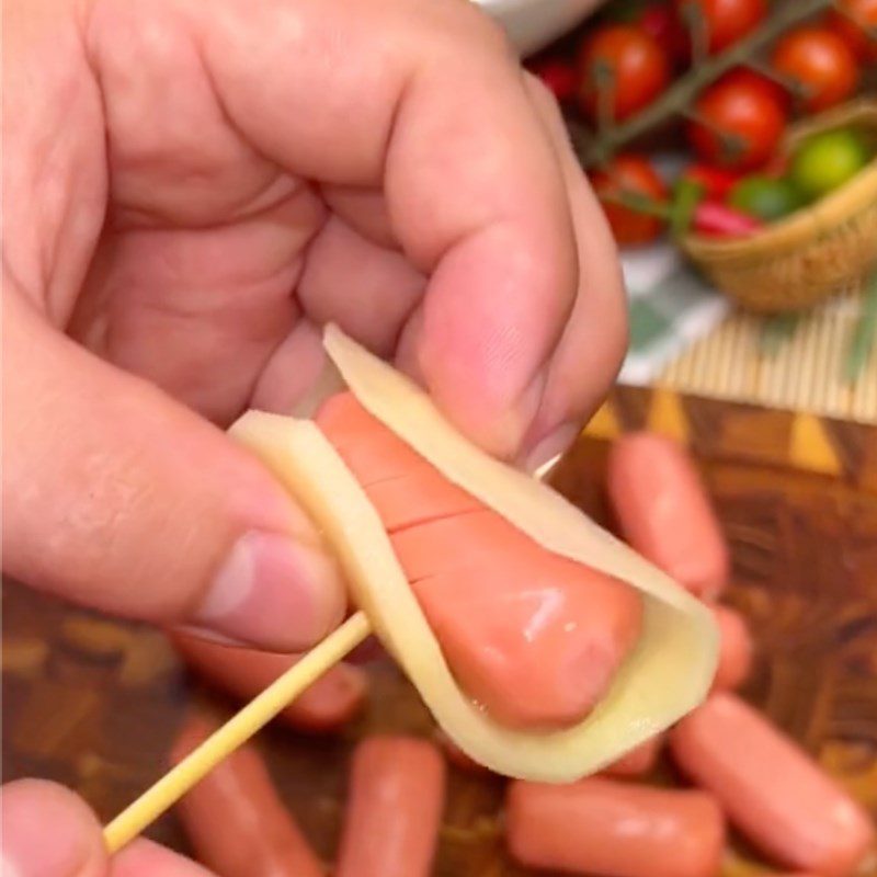 Step 2 Skewered potatoes and sausages How to make fried potato wrapped sausages