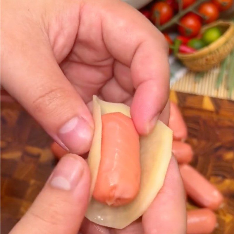 Step 2 Skewered potatoes and sausages How to make fried potato wrapped sausages