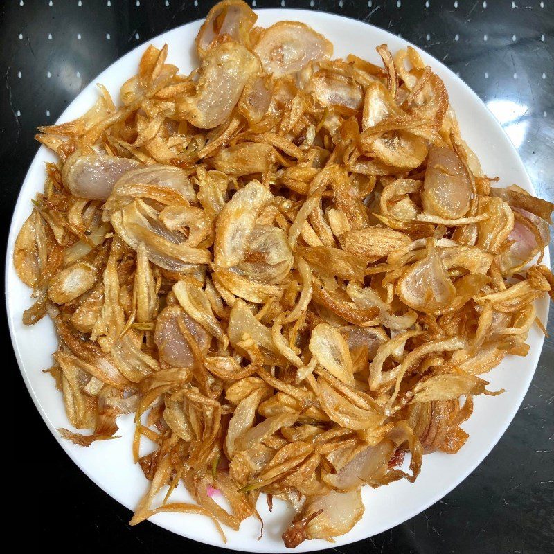 Step 2 Stir-fry clams and fry onions Clam porridge