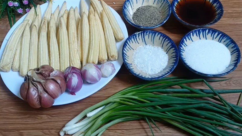 Ingredients for young corn stewed with pepper and tomatoes