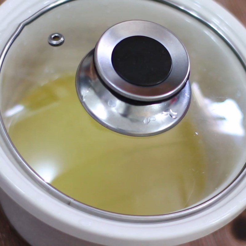 Step 1 Wash rice and cook plain porridge Beef porridge in a slow cooker